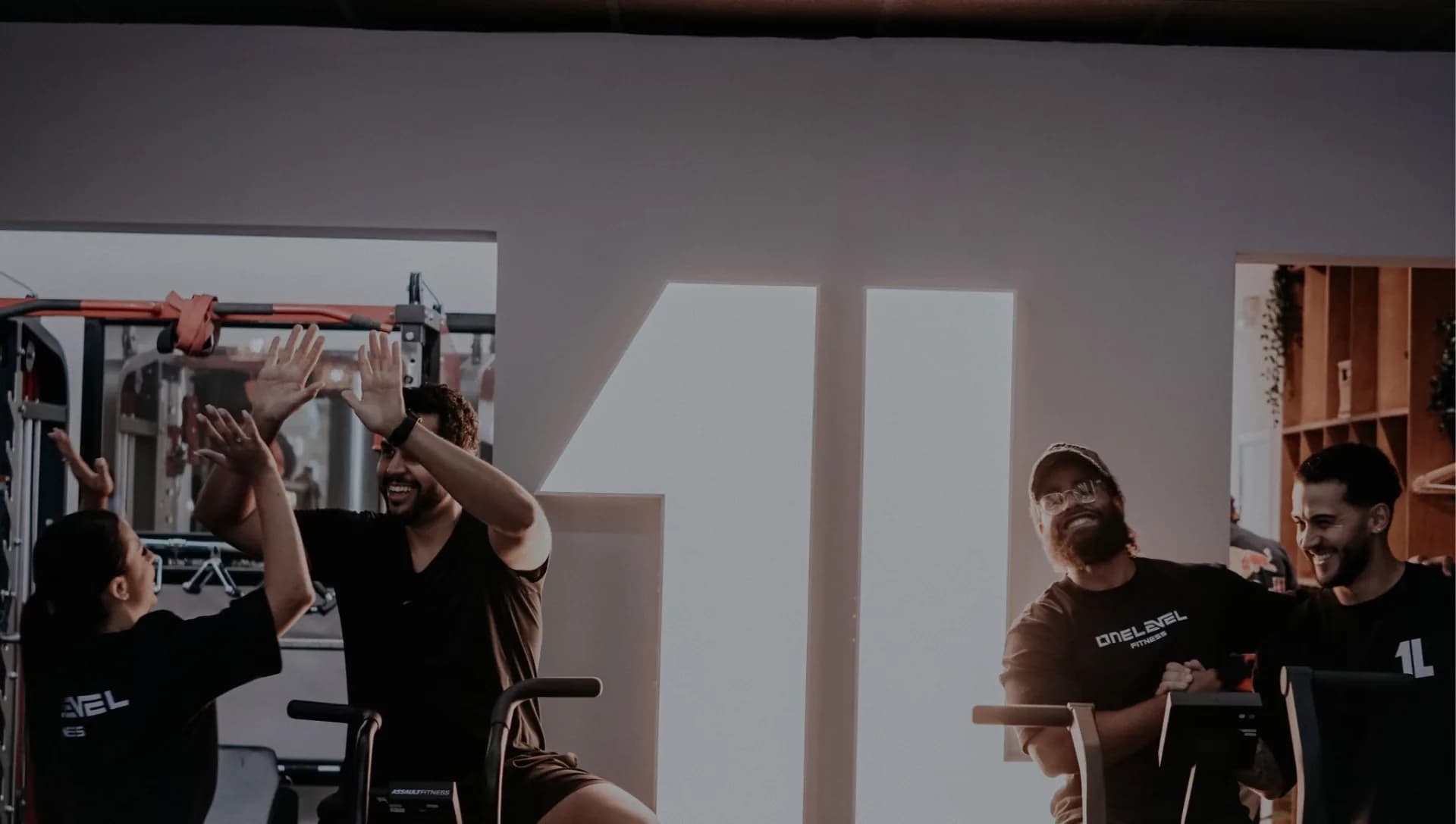 One Level Fitness members training together